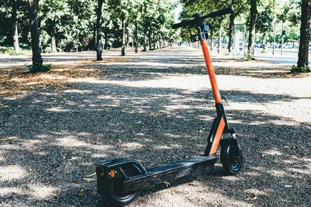 stand alone with e-scooter